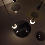 Eclipses
acrylic and enamel paint on light-globes, mirrors, electrical fittings, electricity